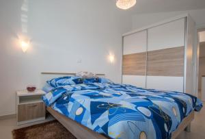 En eller flere senge i et værelse på Apartment Verunic 14286d