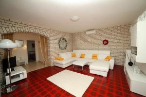 A seating area at Family friendly apartments with a swimming pool Bol, Brac - 14379