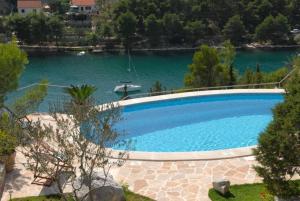 Fotografia z galérie ubytovania Seaside luxury villa with a swimming pool Bobovisca na Moru, Brac - 14405 v destinácii Milna