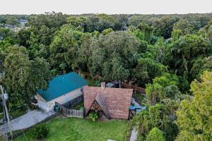 an overhead view of a house with a green roof at Woodland Garden in Tampa