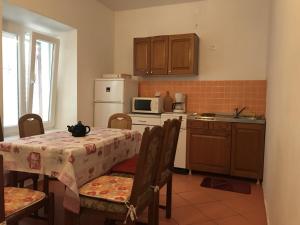 A kitchen or kitchenette at Holiday house with a parking space Kustici, Pag - 14438