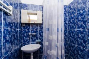 Koupelna v ubytování Apartment Pjestata 14440b