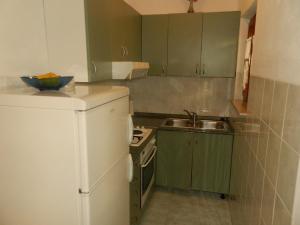 Küche/Küchenzeile in der Unterkunft Apartment Povlja 14399c