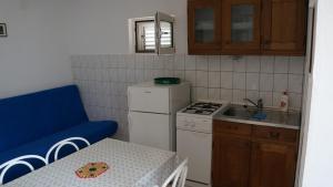Fotografia z galérie ubytovania Apartments by the sea Kustici, Pag - 14522 v destinácii Zubovići