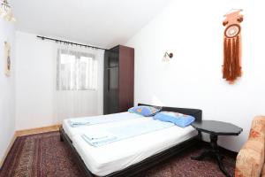 Posteľ alebo postele v izbe v ubytovaní Apartment Slatine 16345a