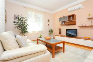 Televízia a/alebo spoločenská miestnosť v ubytovaní Apartments with WiFi Split - 16420