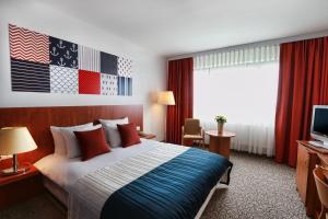 Postel nebo postele na pokoji v ubytování Mercure Gdynia Centrum