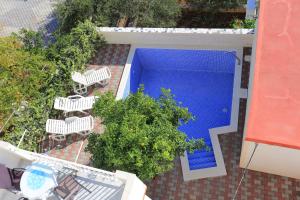 Fotografia z galérie ubytovania Family friendly apartments with a swimming pool Mavarstica, Ciovo - 16559 v Trogiri