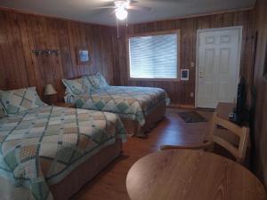 Voodi või voodid majutusasutuse Rocky Mountain Inn toas