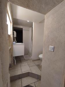 Ванна кімната в Pont De Crau