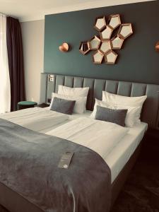Кровать или кровати в номере Hotel du Nord Alster - auf der Uhlenhorst