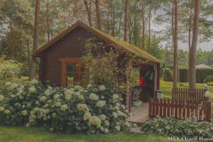 Zahrada ubytování SILVA Guest House - dom wczasowy, tenis, basen, balia i sauna