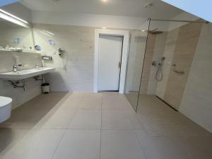 Koupelna v ubytování Hotel Reza