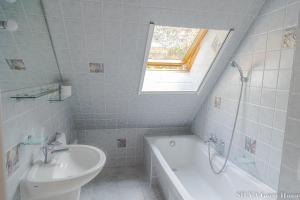 Koupelna v ubytování SILVA Guest House - dom wczasowy, tenis, basen, balia i sauna