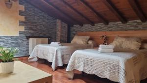 A bed or beds in a room at Casa Cuevas