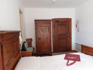 Ένα ή περισσότερα κρεβάτια σε δωμάτιο στο Castel Pergine