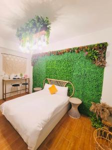 Letto o letti in una camera di W Homestay