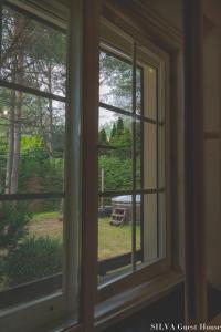 Zahrada ubytování SILVA Guest House - dom wczasowy, tenis, basen, balia i sauna