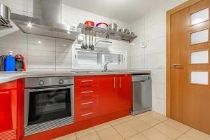 Kuchyň nebo kuchyňský kout v ubytování Tenerifeopenhome Townhouse Oasis Fañabe 40