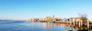 a group of houses on the side of a river at La casa di Alice in Venice