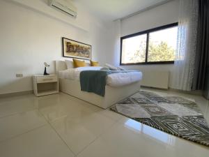 Ein Bett oder Betten in einem Zimmer der Unterkunft Lemon Tree Residence