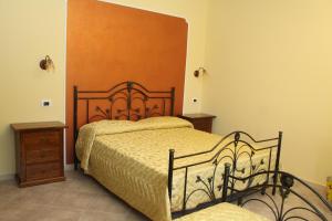 Postel nebo postele na pokoji v ubytování Agriturismo La Gemma del Parco