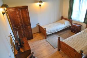 Postel nebo postele na pokoji v ubytování Klecherova House