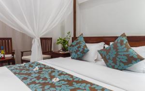 Bayon Modern Residence客房内的一张或多张床位