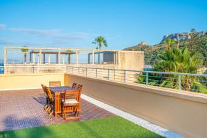 A balcony or terrace at Terrazza Sella Del Diavolo - Vista Mare - WiFi AC