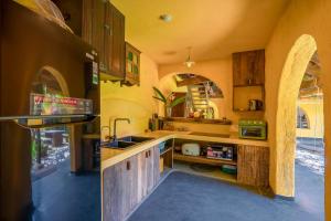 a kitchen with a sink and a counter top at Ben Villa 3BR Beachfront An Bang Beach Hoi An by Beachside Boutique Homes in An Bang +20 photos