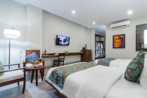 Bayon Modern Residence的电视和/或娱乐中心
