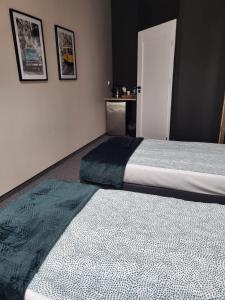 Postel nebo postele na pokoji v ubytování Apartamenty CITI