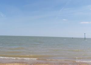 a view of the ocean from the beach at Adorable 2 bedroom holiday home in Clacton-on-Sea in Clacton-on-Sea