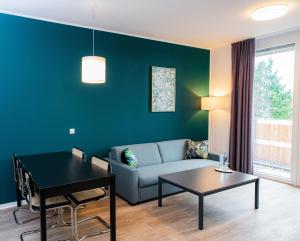 Posezení v ubytování Das ELB Boardinghouse Hotel Restaurant