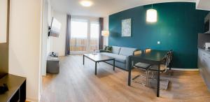 Posezení v ubytování Das ELB Boardinghouse Hotel Restaurant