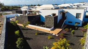 an aerial view of a house at Villa DaVinci - Playa Blanca in Playa Blanca +46 photos