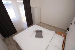 Postel nebo postele na pokoji v ubytování Vurk INN Paracin