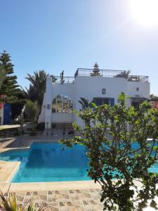 Bazén v ubytování Au jardin d’Aghir: Villa arborée, avec piscine privée sans vis à vis! nebo v jeho okolí