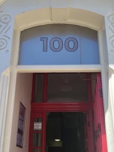 a door to a building with a sign above it at The Lumada in Blackpool