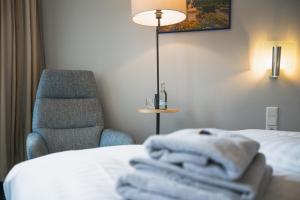 Ein Bett oder Betten in einem Zimmer der Unterkunft Hotel in Herrenhausen