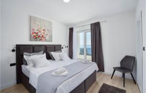 Posteľ alebo postele v izbe v ubytovaní Nice Home In Makarska