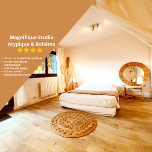 1 dormitorio con cama y alfombra en el suelo en Superbe appartement Boheme dans les vignes en Nimes