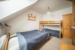 Postel nebo postele na pokoji v ubytování Apartmány Rubínovi