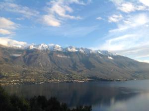 a view of a mountain range with a body of water at Casa Bine in Tremosine Sul Garda +76 photos