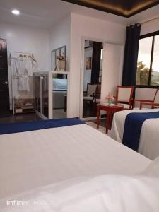 Postel nebo postele na pokoji v ubytování Gmb-Arte' Hotel