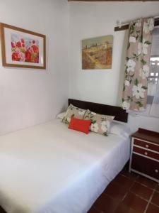 Cama o camas de una habitación en Hotel El Jisu