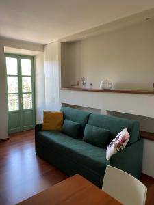 A seating area at Residence delle Tre Corone