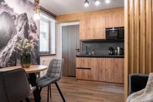 Køkken eller tekøkken på Apartament LOVE TATRas + 10 billeder