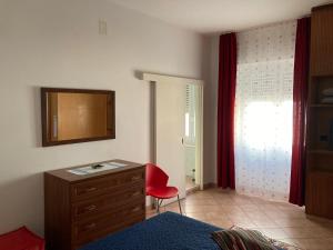 TV a/nebo společenská místnost v ubytování B&B Marsiglia