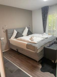 Postel nebo postele na pokoji v ubytování Hotel Il David